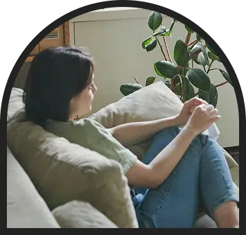 woman sitting on the sofa