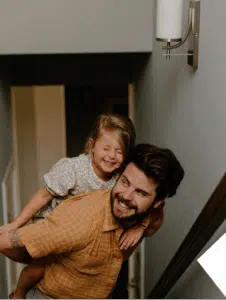 Parent juggling family and career seeking NYC therapy for individuals, couples, and professionals balancing multiple demands.