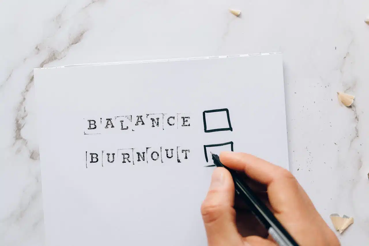 Checklist showing balance versus burnout representing dating and career balance for busy professionals