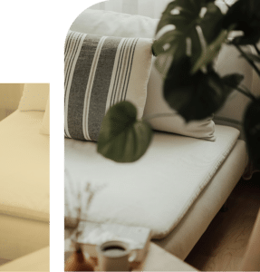 Minimalist white therapy couch with soft cushions in clean space, representing comfort, safety, and healing environment