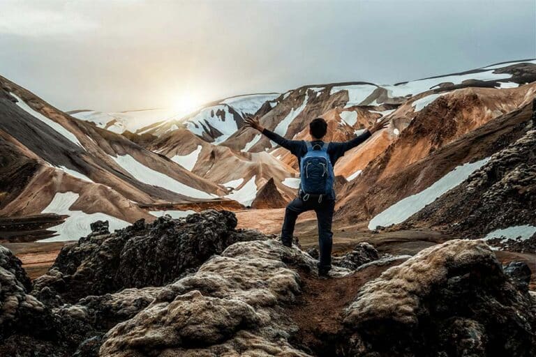 Traveler hiking at Landmannalaugar surreal nature