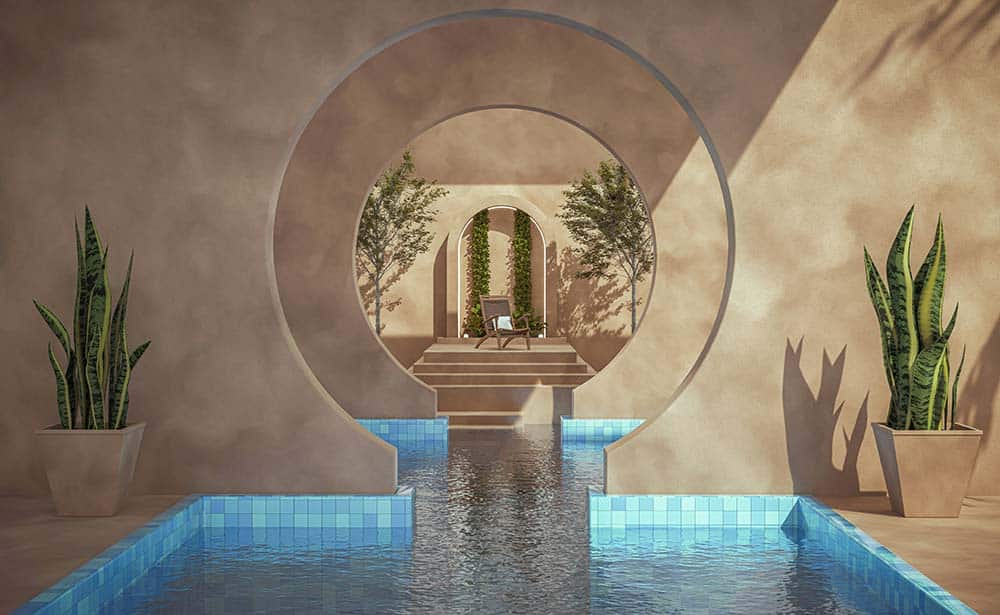 Tranquil pool with a fountain and lush plants in a peaceful garden.